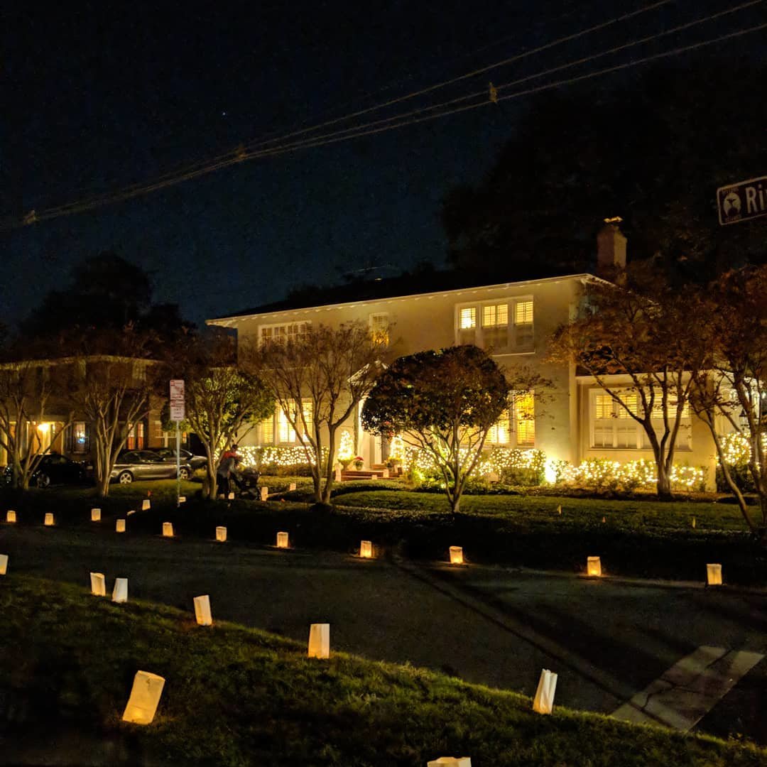 Luminaria in Riverside Avondale at night with luminaries on the sidewalks